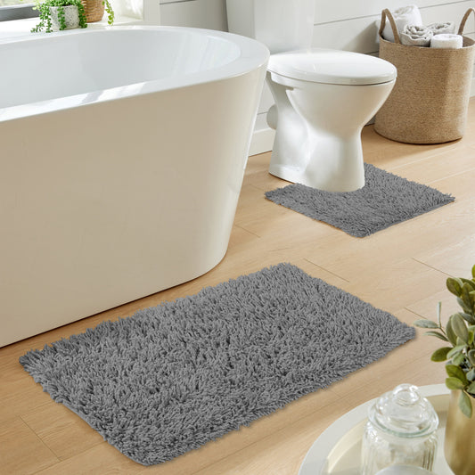 Luxury Como 2 Piece Grey Cotton Bath Mat and Pedestal Set by OLIVIA ROCCO, featuring a non-slip design for safety and superior absorbency, perfect for enhancing bathroom elegance.