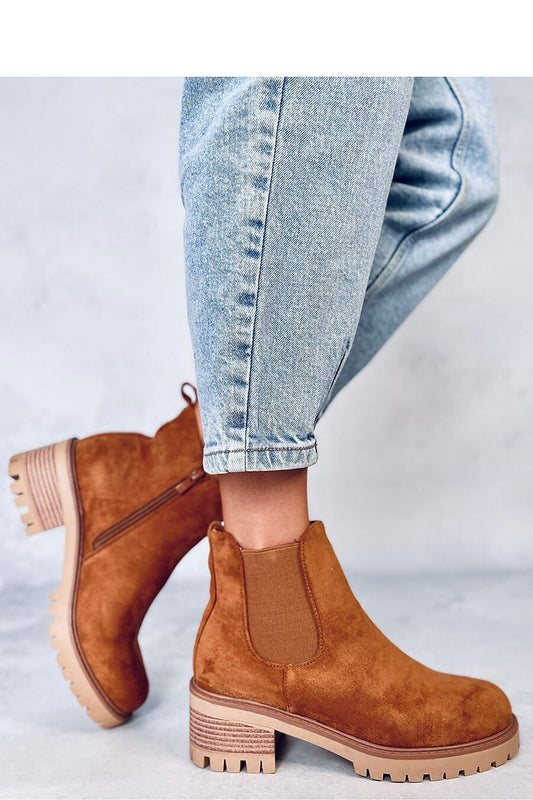 Stylish Inello women's booties showcasing a classic design with a practical zipper closure and protector sole, crafted from eco-friendly suede.
