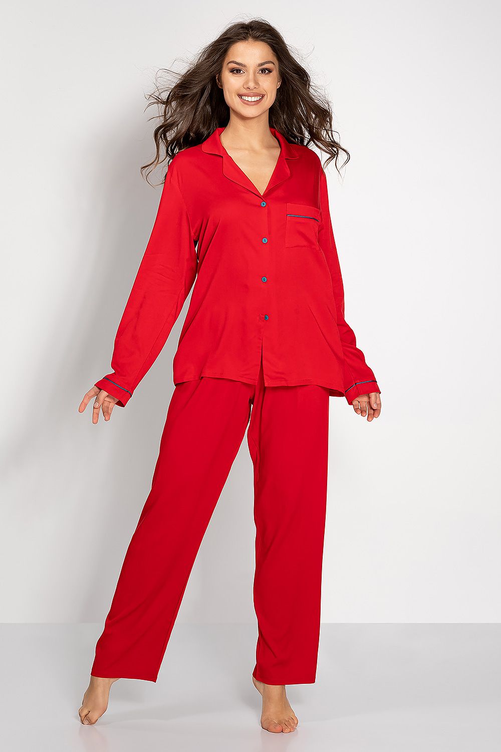 Luxury women's viscose pajama set by Momenti Per Me, featuring long sleeves, an elegant design, and elastic waist pants for ultimate comfort and style.