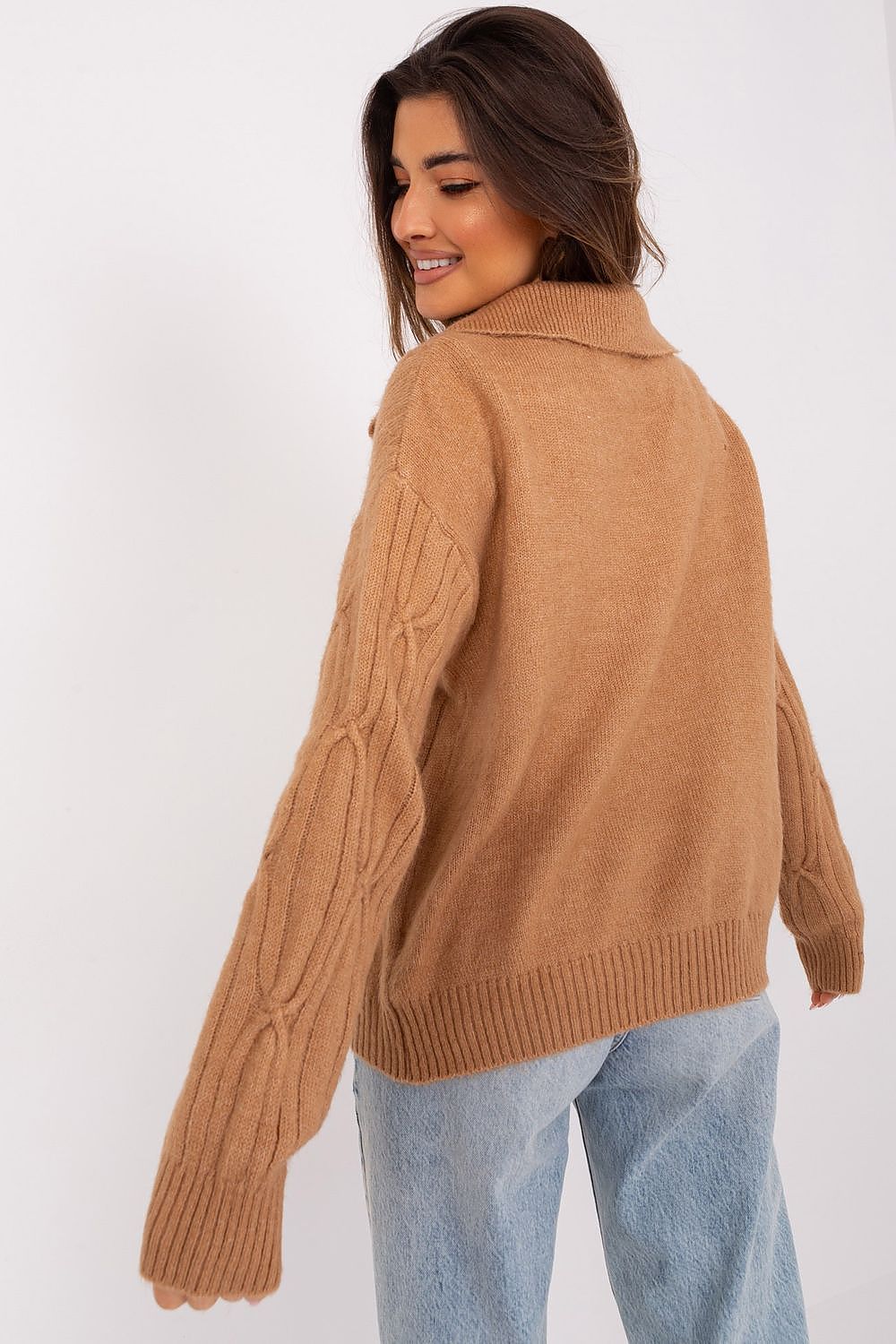 Stylishly paired elegant women's acrylic blend long sleeve sweater by AT, demonstrating its versatility in a chic outfit suitable for various occasions.