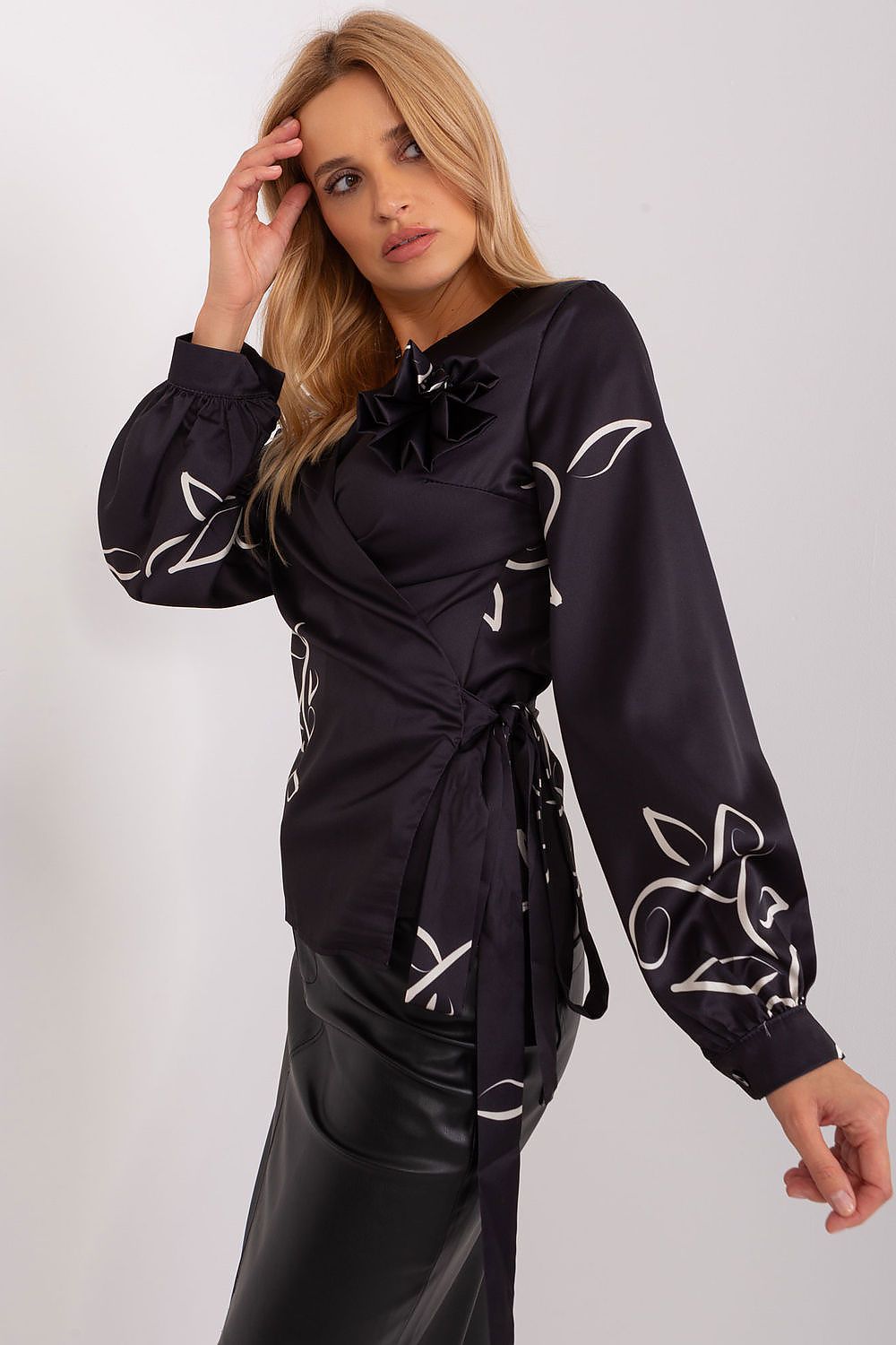 Detailed view of Luxury Lakerta blouse showcasing the unique envelope front, heart neckline, and luxurious patterned fabric for a chic and fashionable appearance.