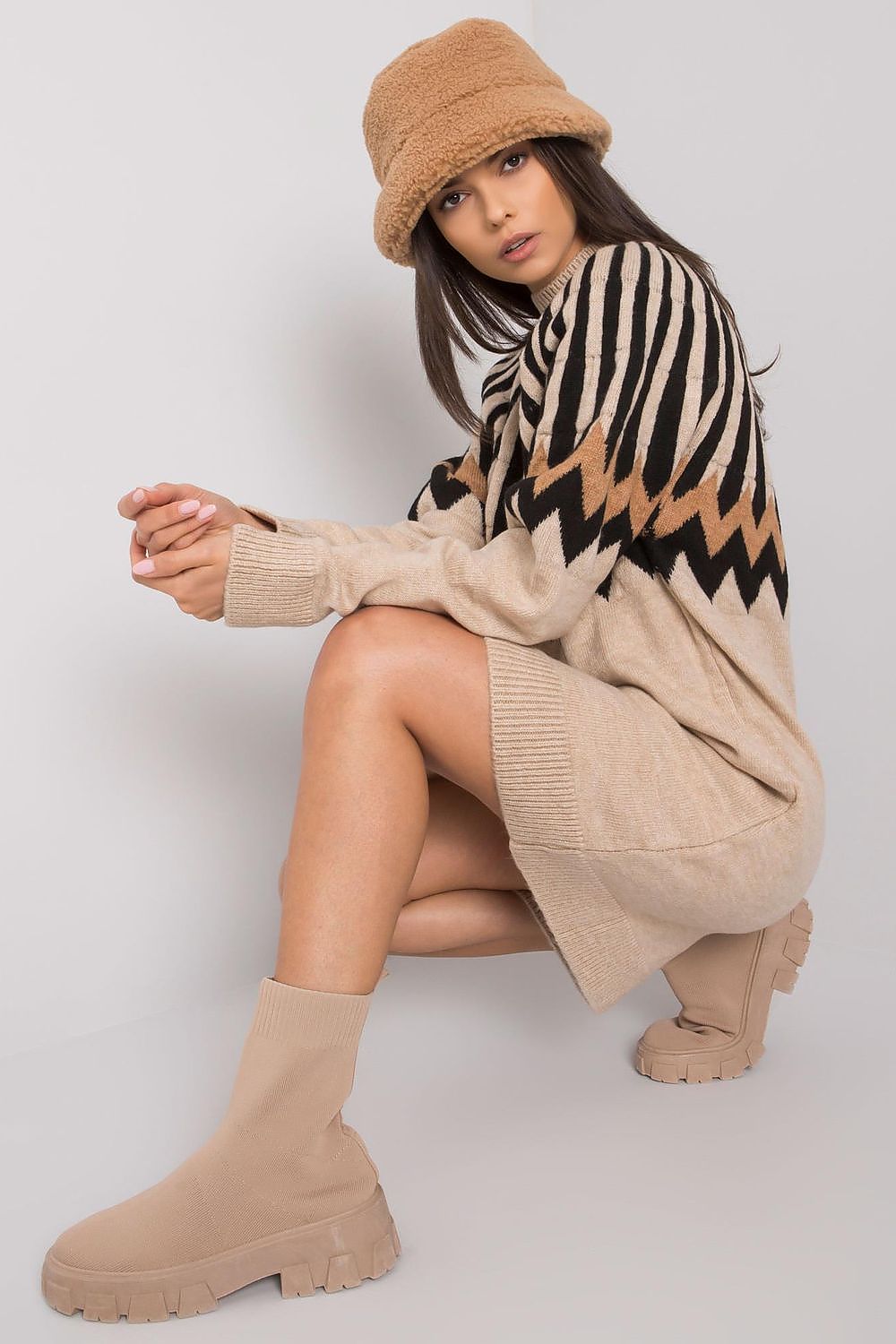 Elegant knitted long sleeve turtleneck dress with geometric pattern by Rue Paris, perfect for sophisticated everyday attire and luxurious occasions.