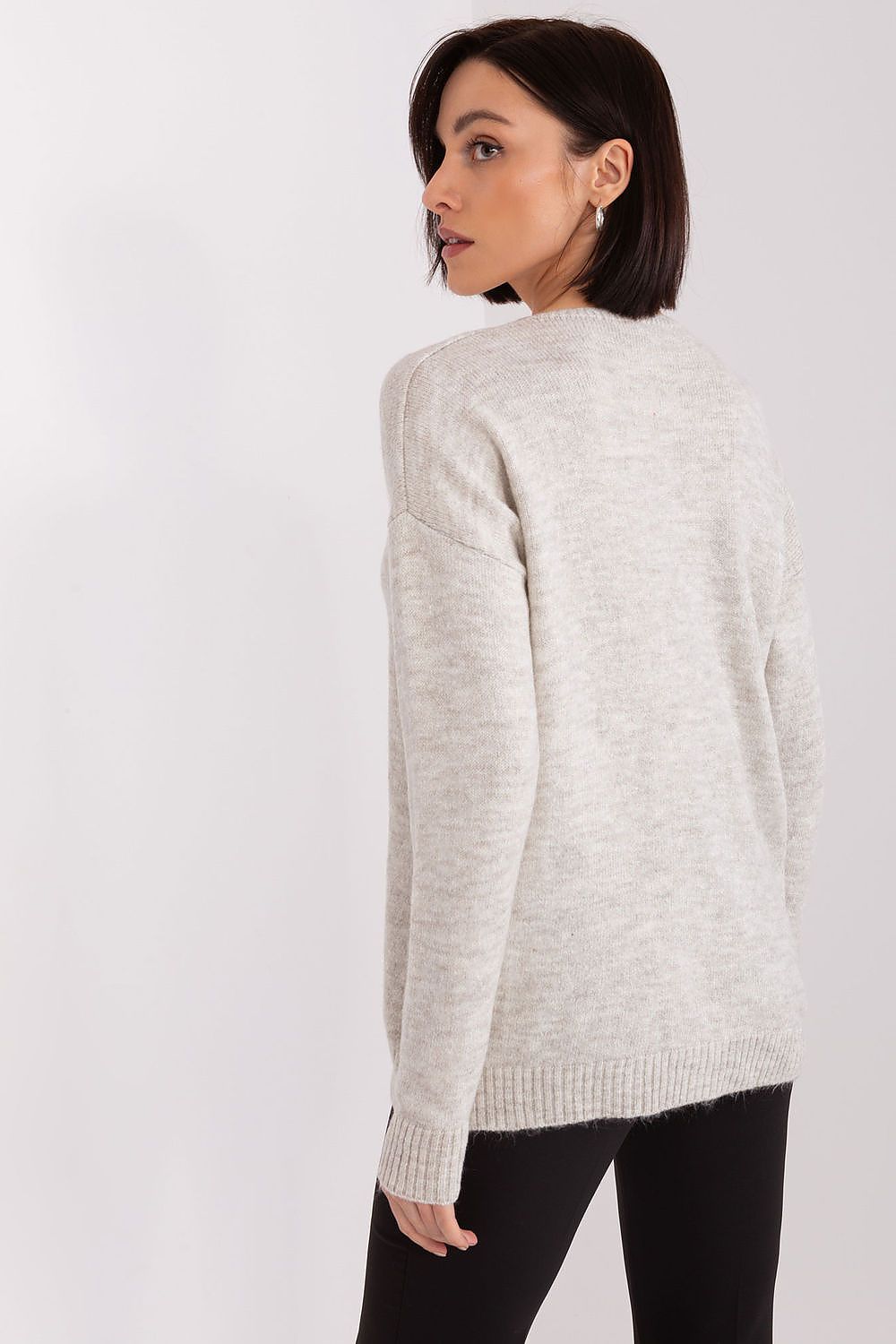Elegant acrylic heart neckline sweater by Rue Paris, showcasing a stylish look ideal for casual or formal occasions.