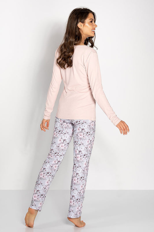 Luxurious comfort and style in women's pyjamas set, designed by Momenti Per Me, highlighting soft materials and beautiful detailing.
