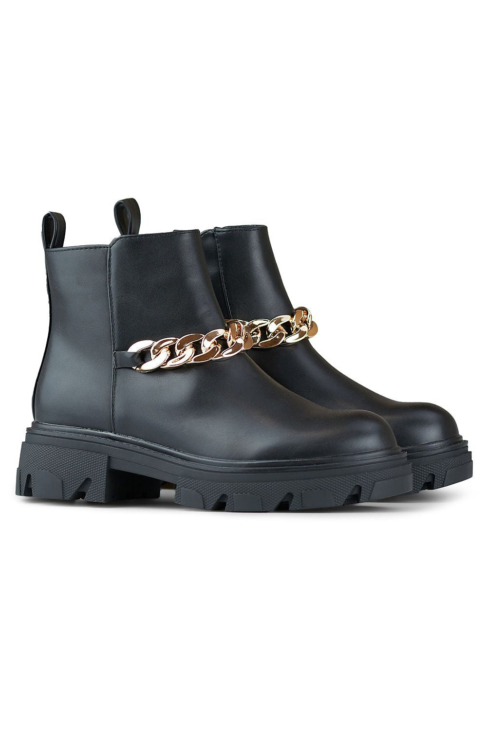 Versatile black PRIMO boots for women with round toe design, ideal for pairing with skirts or dresses, epitomizing luxury and style.