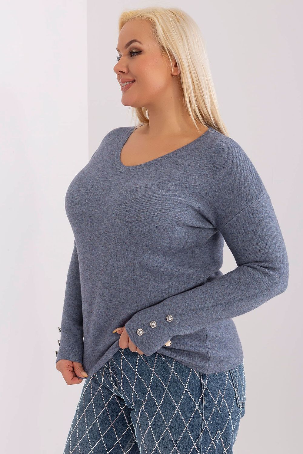 Elegant plus size women's sweater with V-neck and decorative buttons by Factory Price, perfect for stylish workwear and feminine looks.