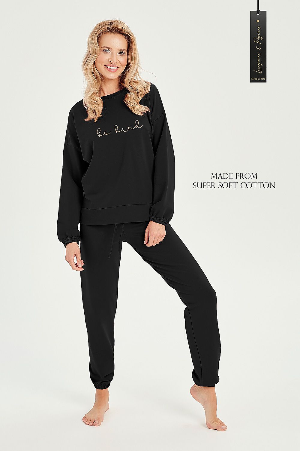 Luxury women's Taro tracksuit set featuring a comfortable cotton-blend sweatshirt and elegant loose pants, perfect for relaxed outings or casual wear.
