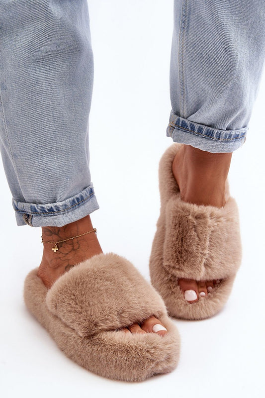 Step in Style eco-friendly fur slippers for women, featuring a comfortable rubber sole and elegant open toe, perfect for luxury relaxation.