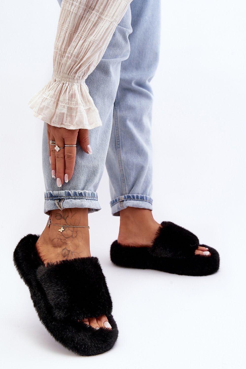 Elegant slip-on eco-friendly fur slippers for women, showcasing a chic open toe and durable rubber sole, crafted by Step in Style.