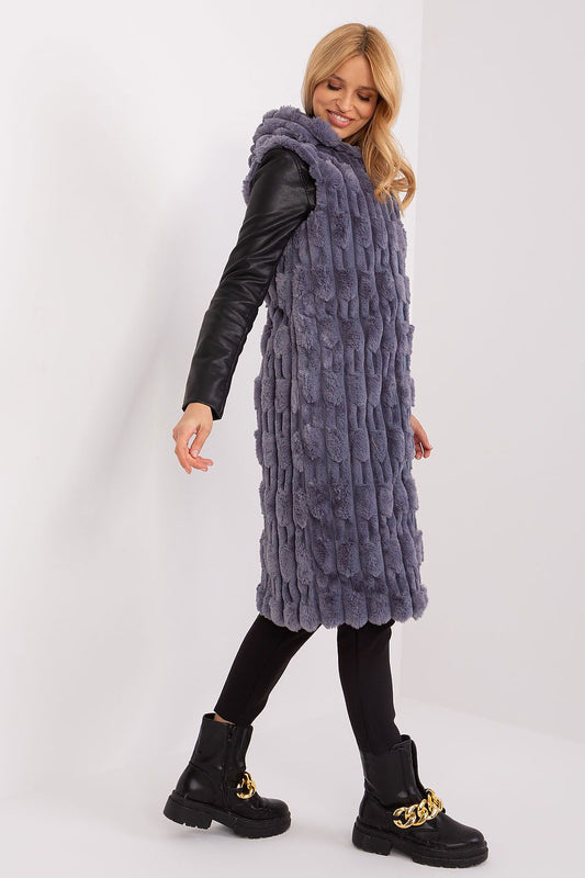 AT's exquisite fur vest with zipper closure and insulation, showcasing style and functionality for cold winter days.