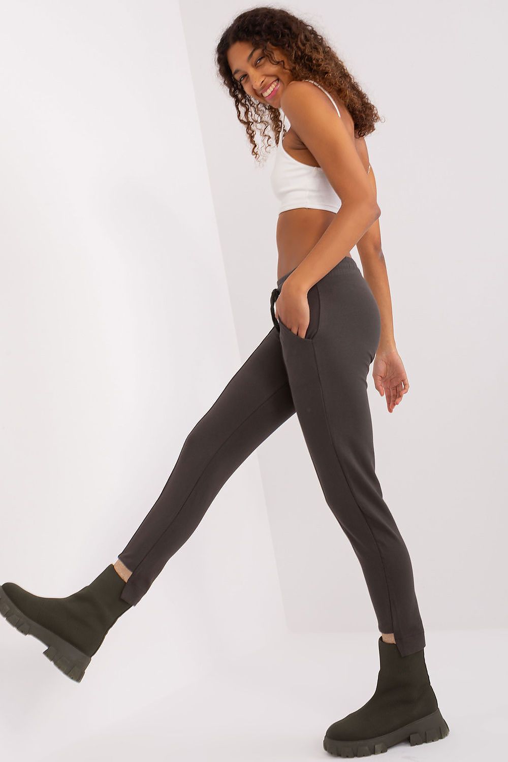 Women's high waist tracksuit trousers by Relevance, designed for a flattering silhouette and perfect for casual outings.