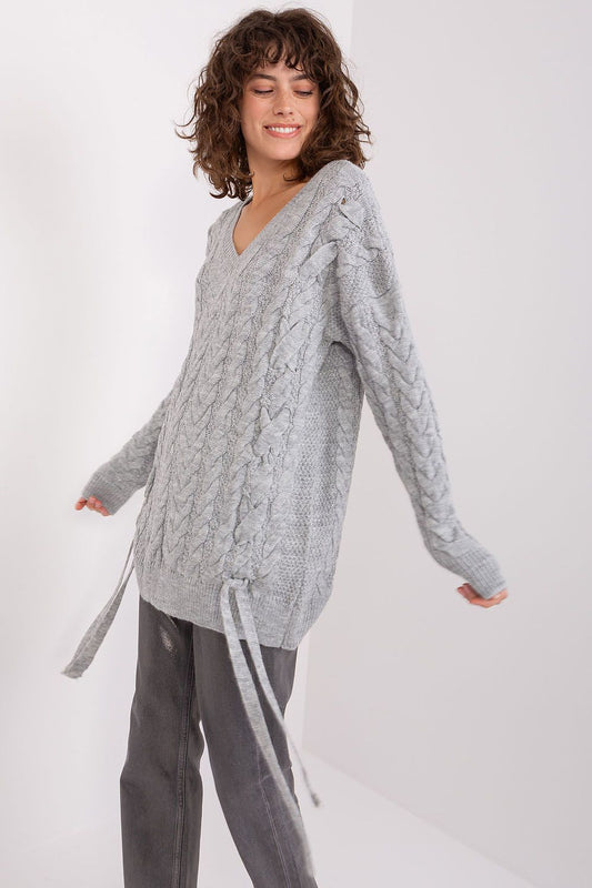Stylish long sleeve women's sweater by Badu, featuring a heart neckline and chic plaid design for modern elegance.