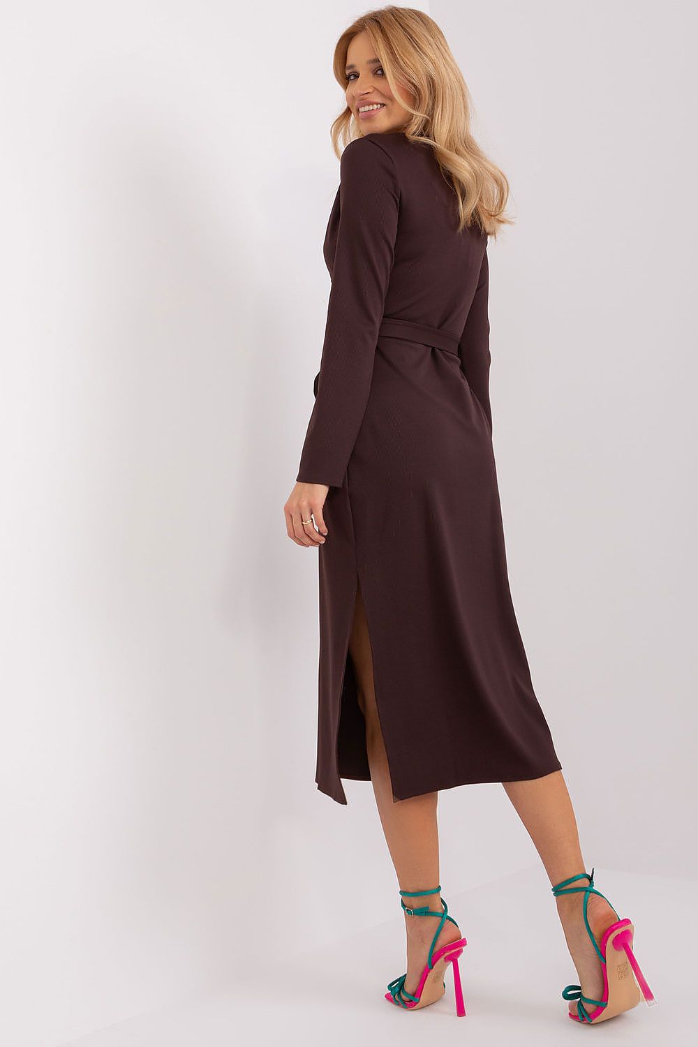 Beautifully styled long sleeve daydress by Lakerta, featuring a heart neckline and chic tie belt, perfect for elevating your wardrobe with sophistication.