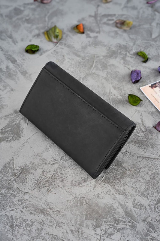 Interior view of Galanter women's floral wallet, highlighting the multiple compartments for bills, cards, and coins, designed for elegance and functionality.