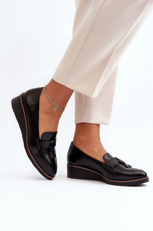 Close-up view of Step in Style Women’s Eco Leather Low Shoes, featuring almond toes and a stylish decorative stripe, ideal for adding a touch of luxury to casual or formal attire.