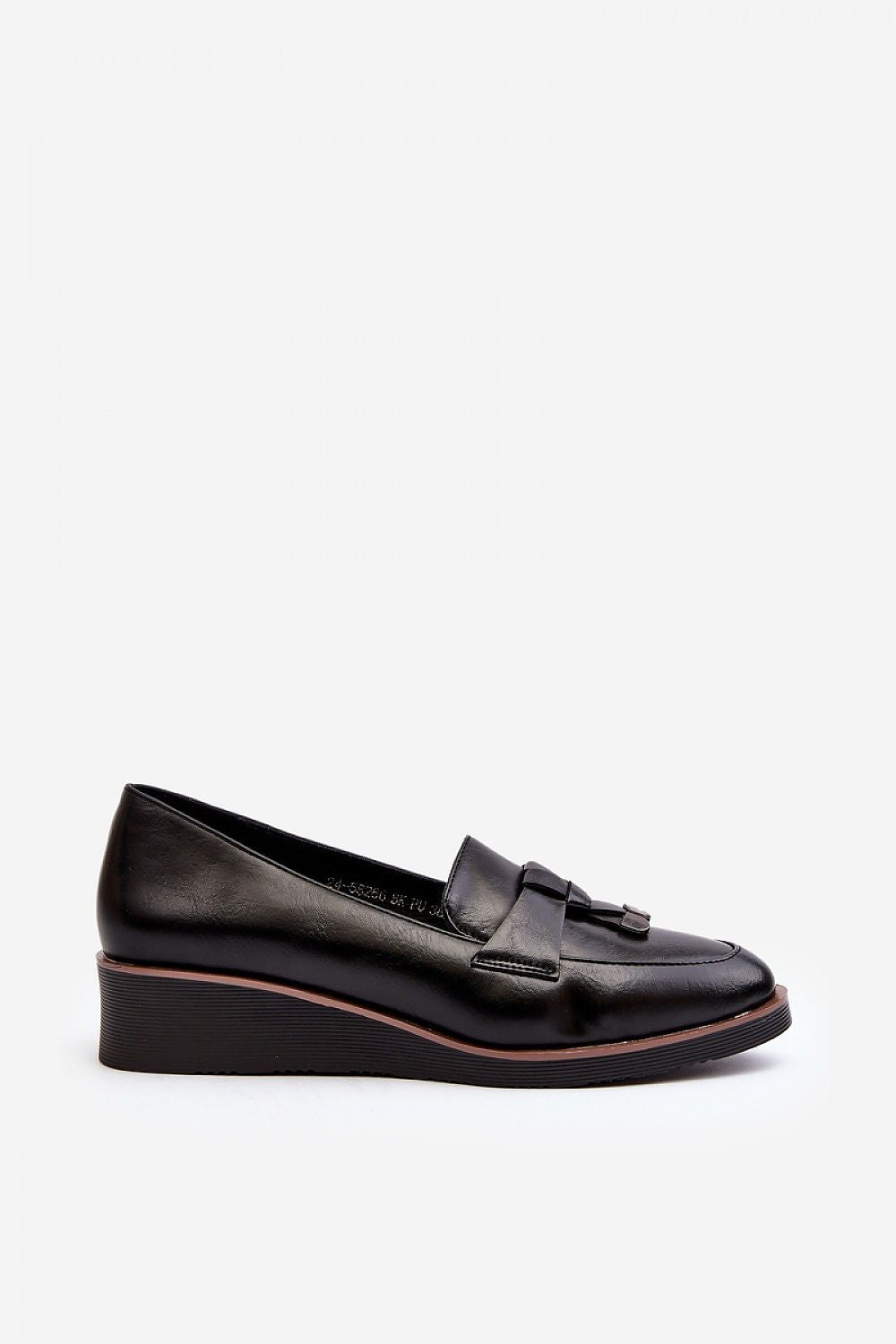 Step in Style Women’s Eco Leather Low Shoes displayed with a fashionable outfit, highlighting their versatility and chic design suitable for modern women who appreciate luxury.