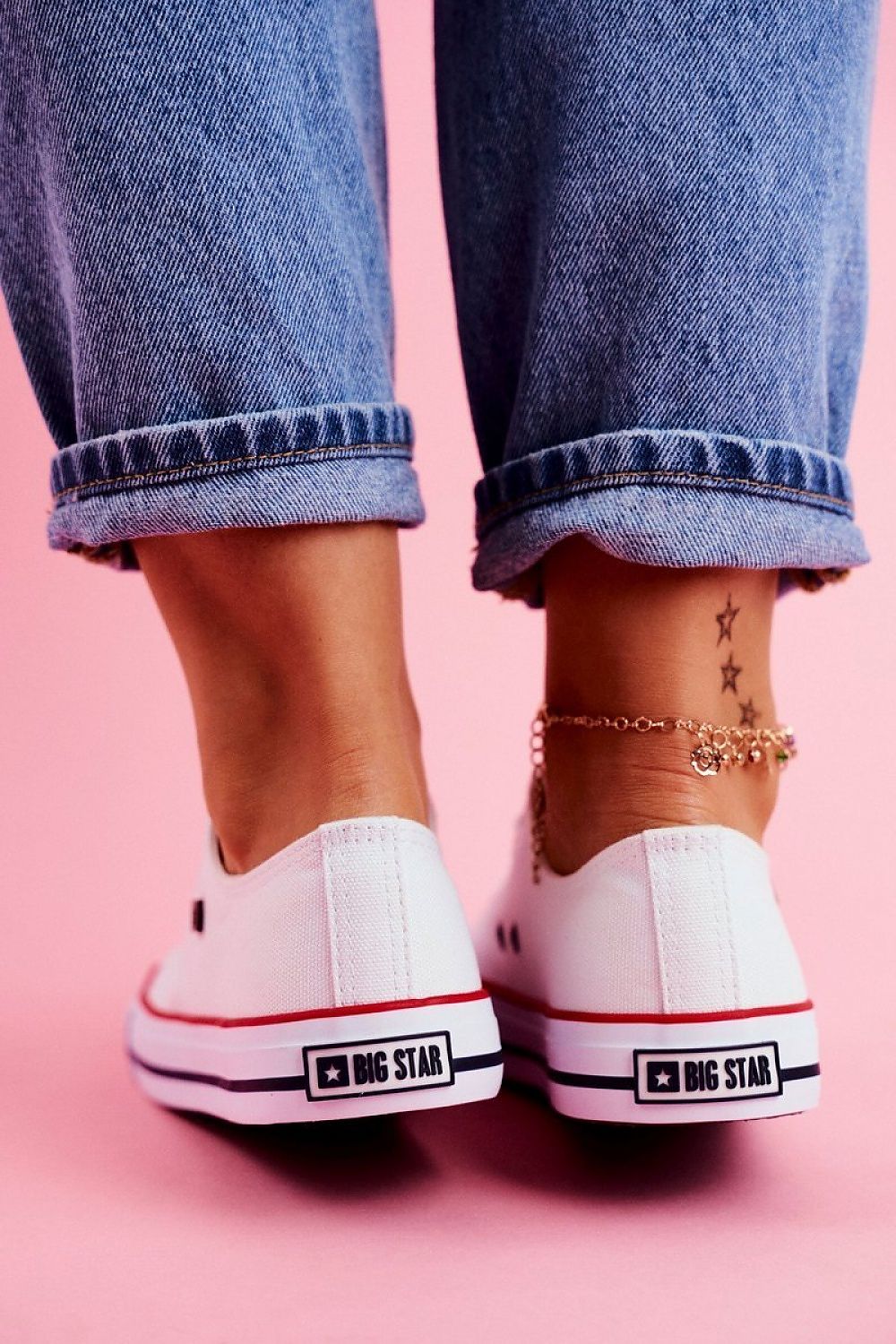 Classic white lace-up sneakers by Step in Style, showcasing timeless design and unparalleled comfort, ideal for casual outings and fashion enthusiasts.