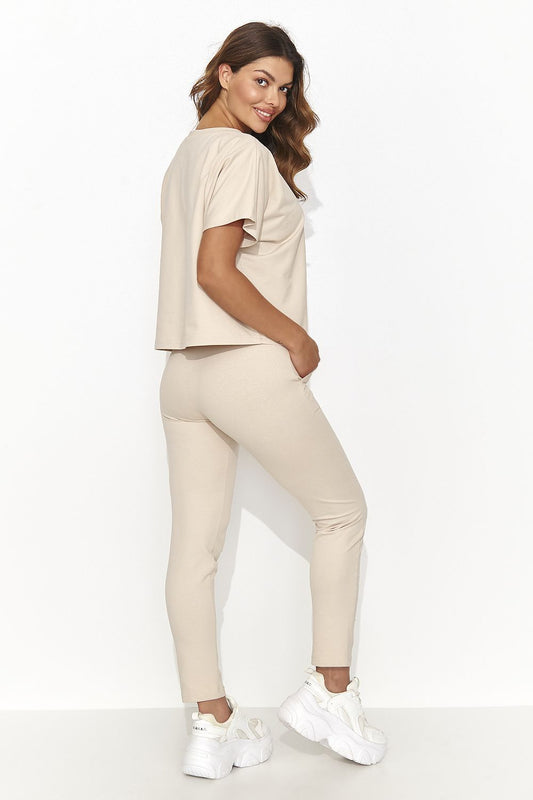 Close-up view of the Numinou knitted set, showcasing the soft texture of the cotton and spandex blend, embodying elegance and comfort.