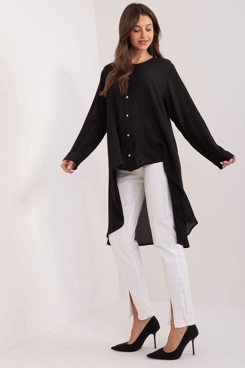 Timeless Lakerta long sleeve shirt crafted from a breathable cotton blend, offering elegance with its round neckline and unique asymmetrical hem.