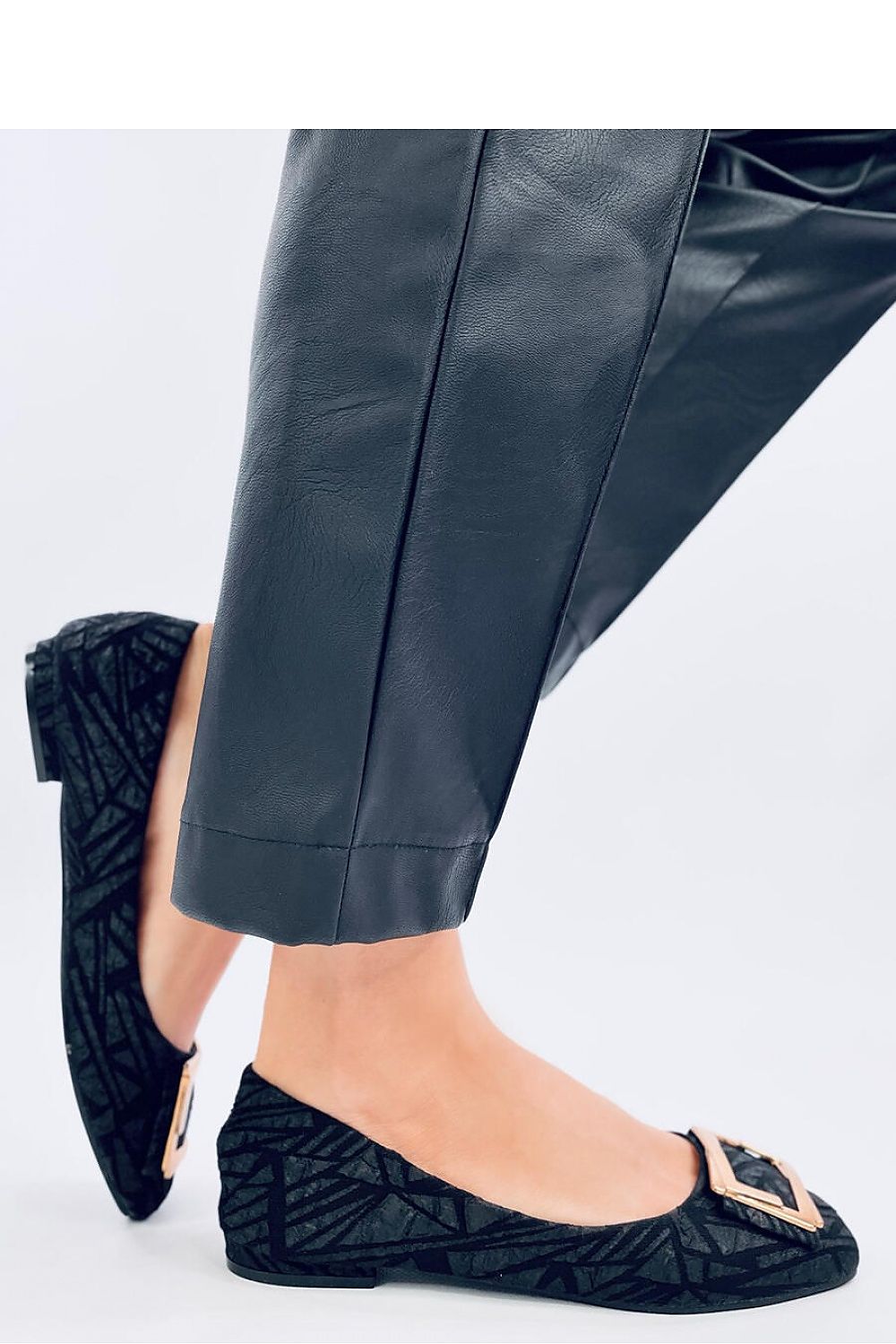 Side view of Inello's luxurious ballet flats showcasing a textured fabric design and gold buckle detail, ideal for fashionable women.