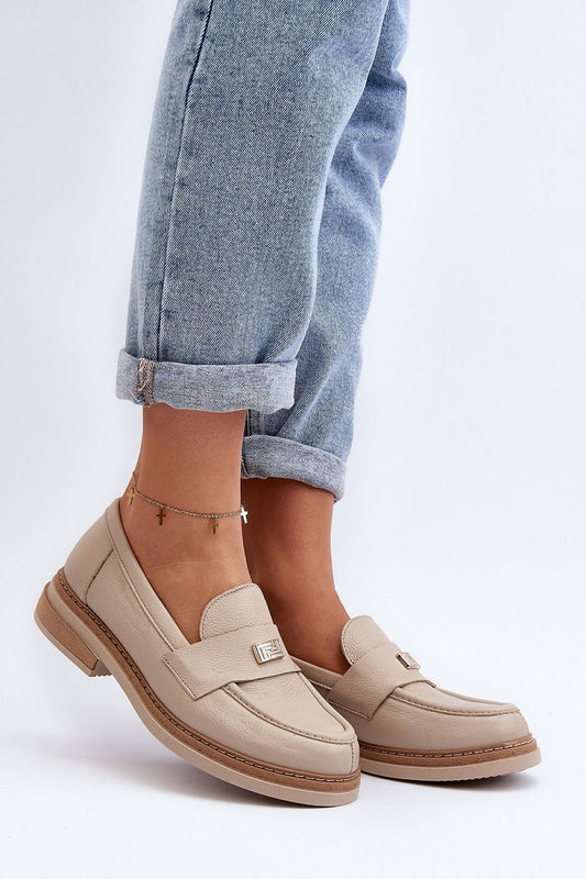 Chic beige women's moccasins featuring a decorative front, perfectly styled with turned-up denim, from the luxury brand Step in Style.