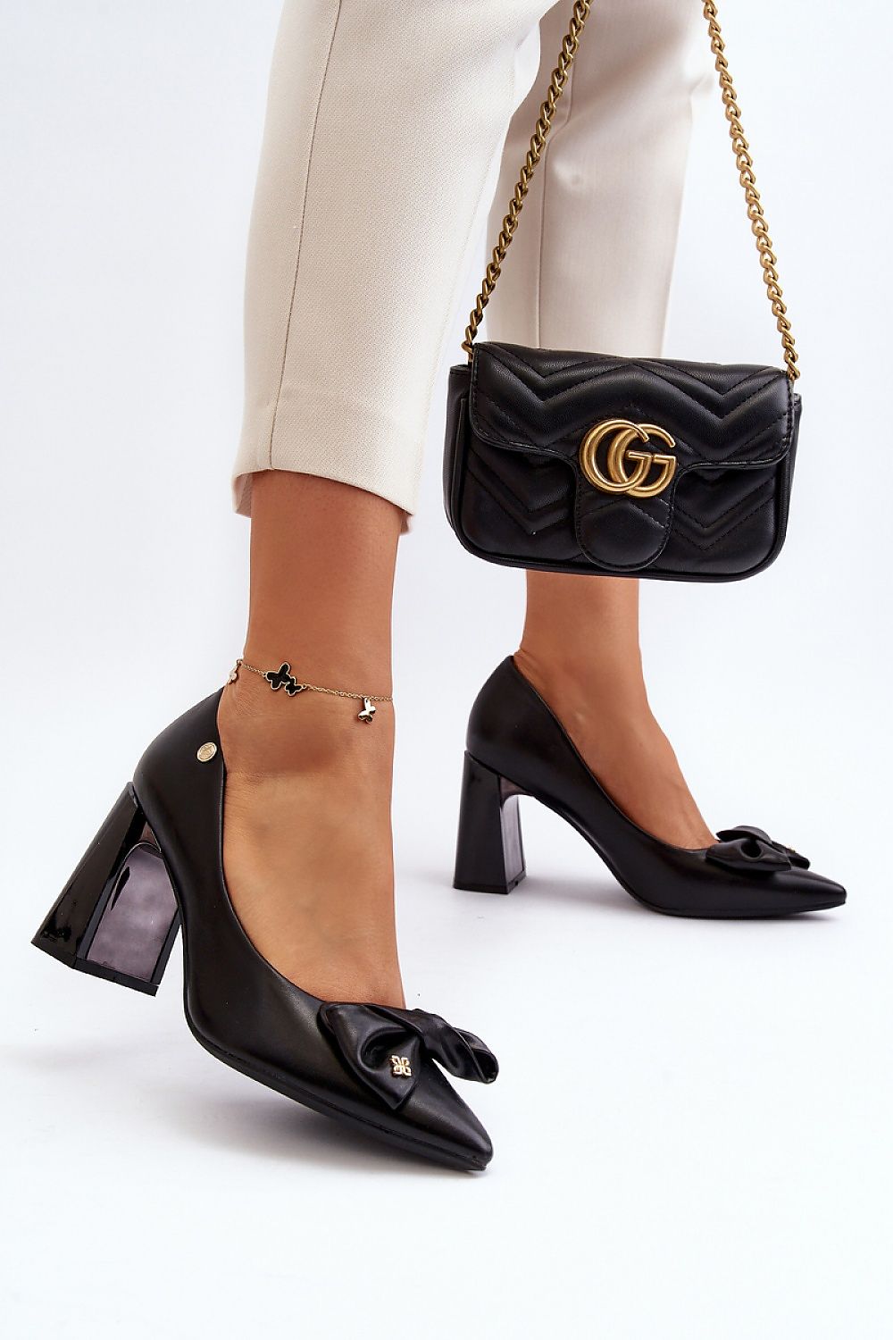 Chic Elegant Block Heel Pumps with Bow by Step in Style displayed elegantly, highlighting their 9 cm stiletto heel and perfect for versatile styling.