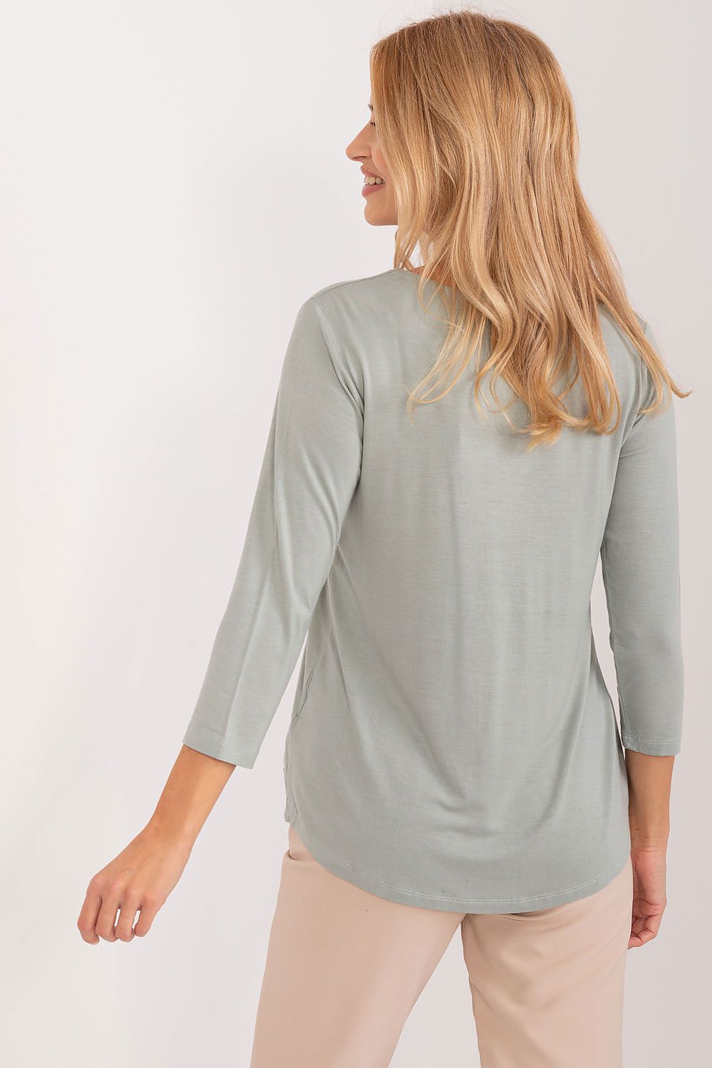 Elegant eco-friendly viscose blouse by Sublevel featuring a stylish heart neckline and 3/4 sleeves, perfect for everyday luxury and comfort.