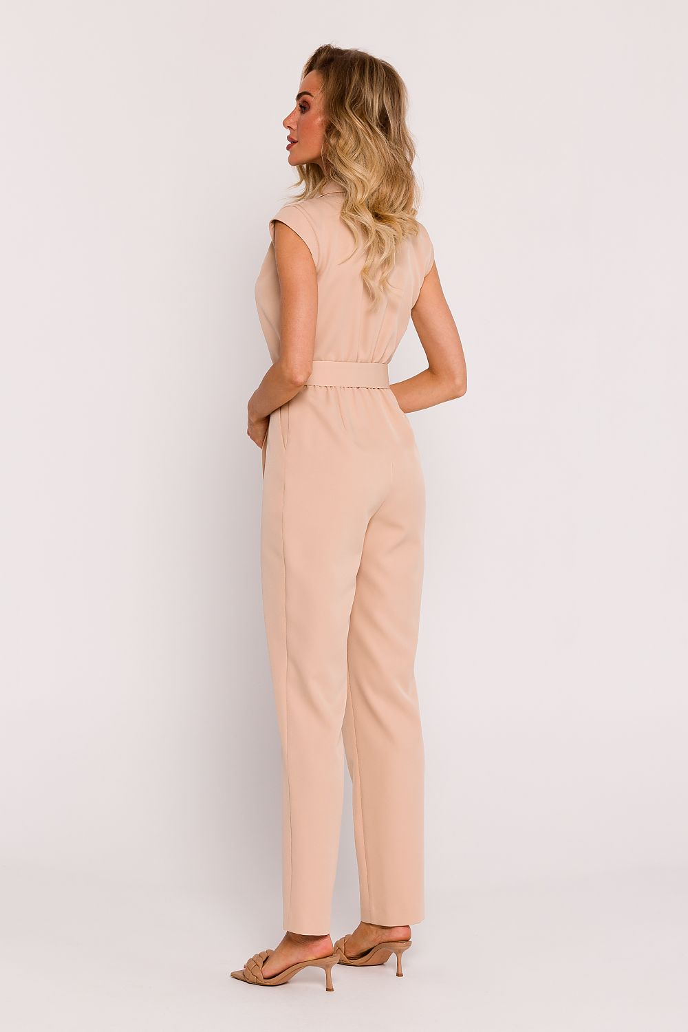 Back view of the Moe Elegant Polish Tailored Jumpsuit illustrating the elastic waist and included belt, merging functionality with a luxurious aesthetic.
