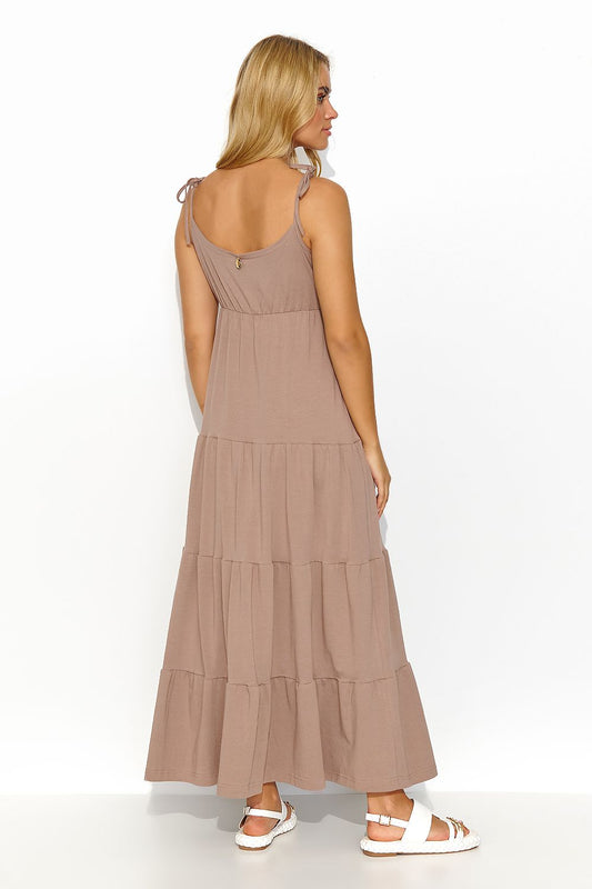 Luxurious Makadamia long summer dress in soft fabric, designed with delicate ruffles and a chic heart neckline, perfect for elegant summer occasions.