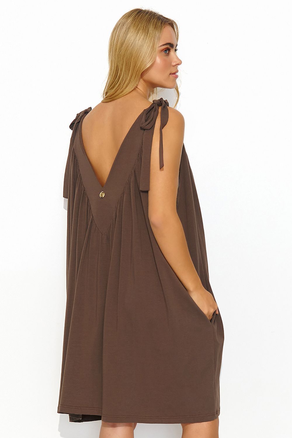 Chic Makadamia deep V-neck maxi dress with airy fabric, perfect for summer outings and ensuring a fashionable and comfortable fit.
