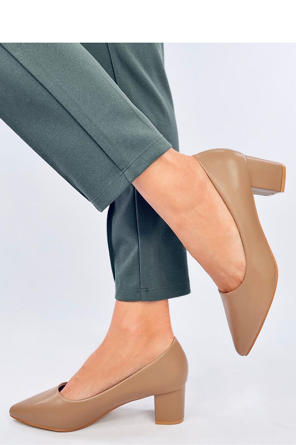 Chic and comfortable women's block heel pumps by Inello, featuring a delicate pointed toe and soft inner insole for all-day wear.