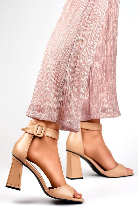 PRIMO luxurious 9cm heel sandals featuring a stylish buckle fastening, perfect for enhancing summer outfits with elegance and comfort.