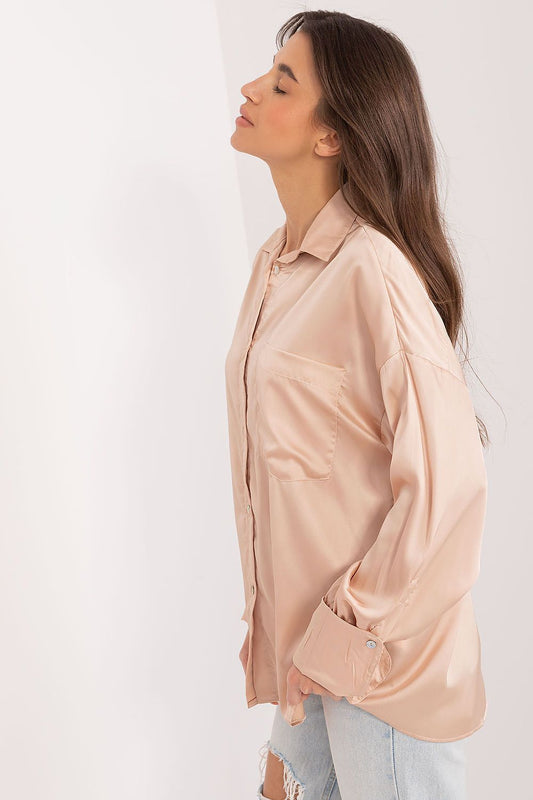 Chic and sophisticated women's satin shirt by Fancy, featuring long sleeves and a stylish pocket, ideal for business meetings and elegant events.