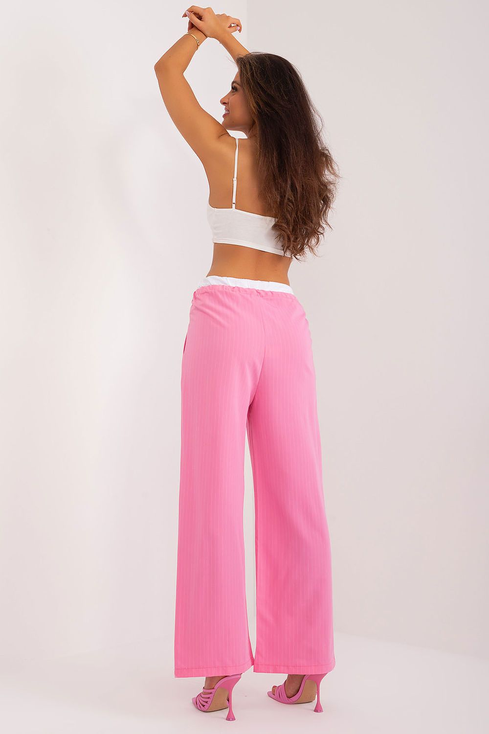 Luxurious wide-leg palazzo trousers designed by Italy Moda, offering a flattering fit and a fashionable silhouette suitable for any event.