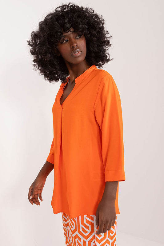 Elegant Sublevel Viscose blouse featuring a graceful V-neck and 3/4 sleeves, perfect for a luxurious everyday look.