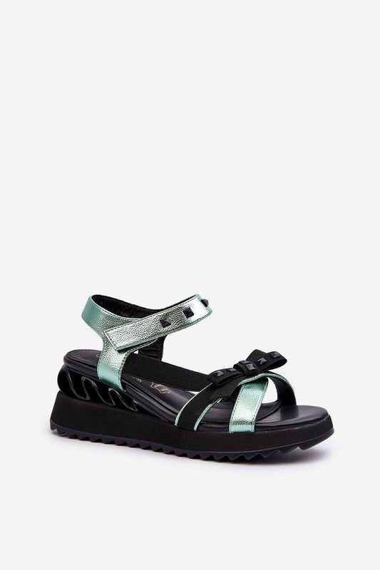 Luxurious women's wedge sandals with stylish bow detail and velcro fastening, crafted by Step in Style for fashionable comfort.