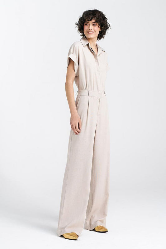 Elegant regular-cut jumpsuit by Nife in a luxurious viscose linen cotton blend featuring a V-neckline and wide legs, perfect for sophisticated occasions.