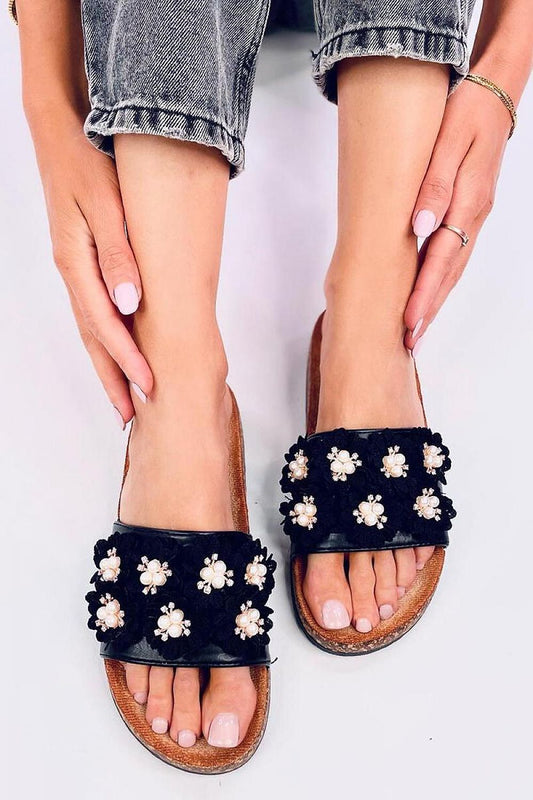 Elegant women's leather sandals by Inello featuring floral accents and sparkling rhinestones on a comfortable cork sole.