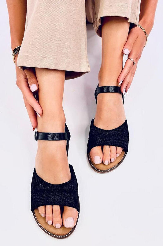 Elegant Inello Women's Flat Sandals with shiny metallic finish, offering stylish comfort for summertime outings.