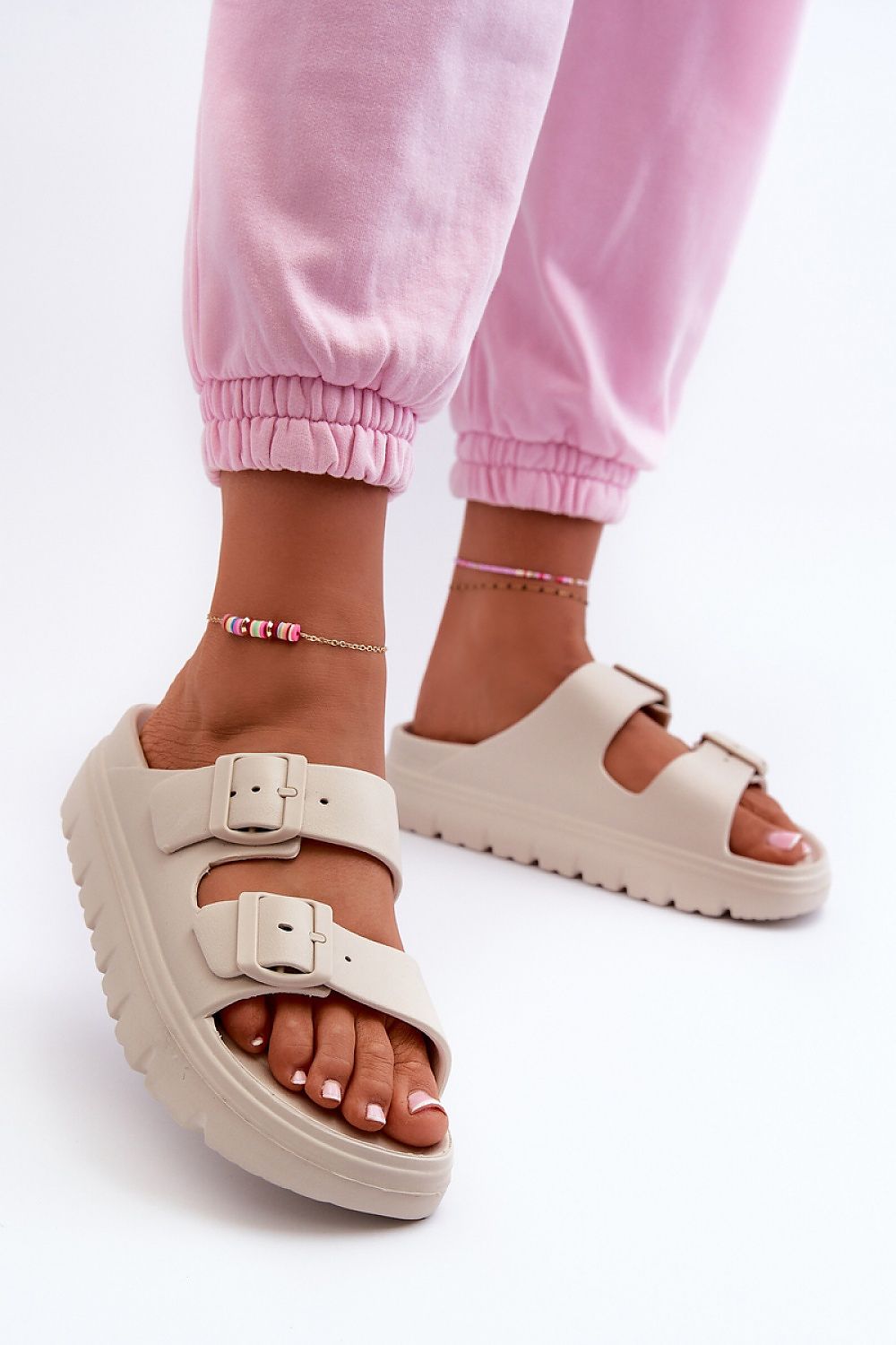 Trendy women's foam flip-flops with a sleek design and 3.5 cm platform height, offering all-day comfort, available from Step in Style.