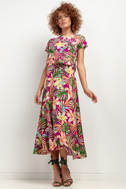 Stylish Tessita lightweight viscose skirt, showcasing its unique patterned design and feminine silhouette