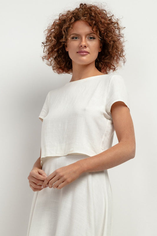Chic Tessita T401 linen blouse showcased in various colours, highlighting its fashionable cut and versatility for summer styling, ideal for heat and comfort.