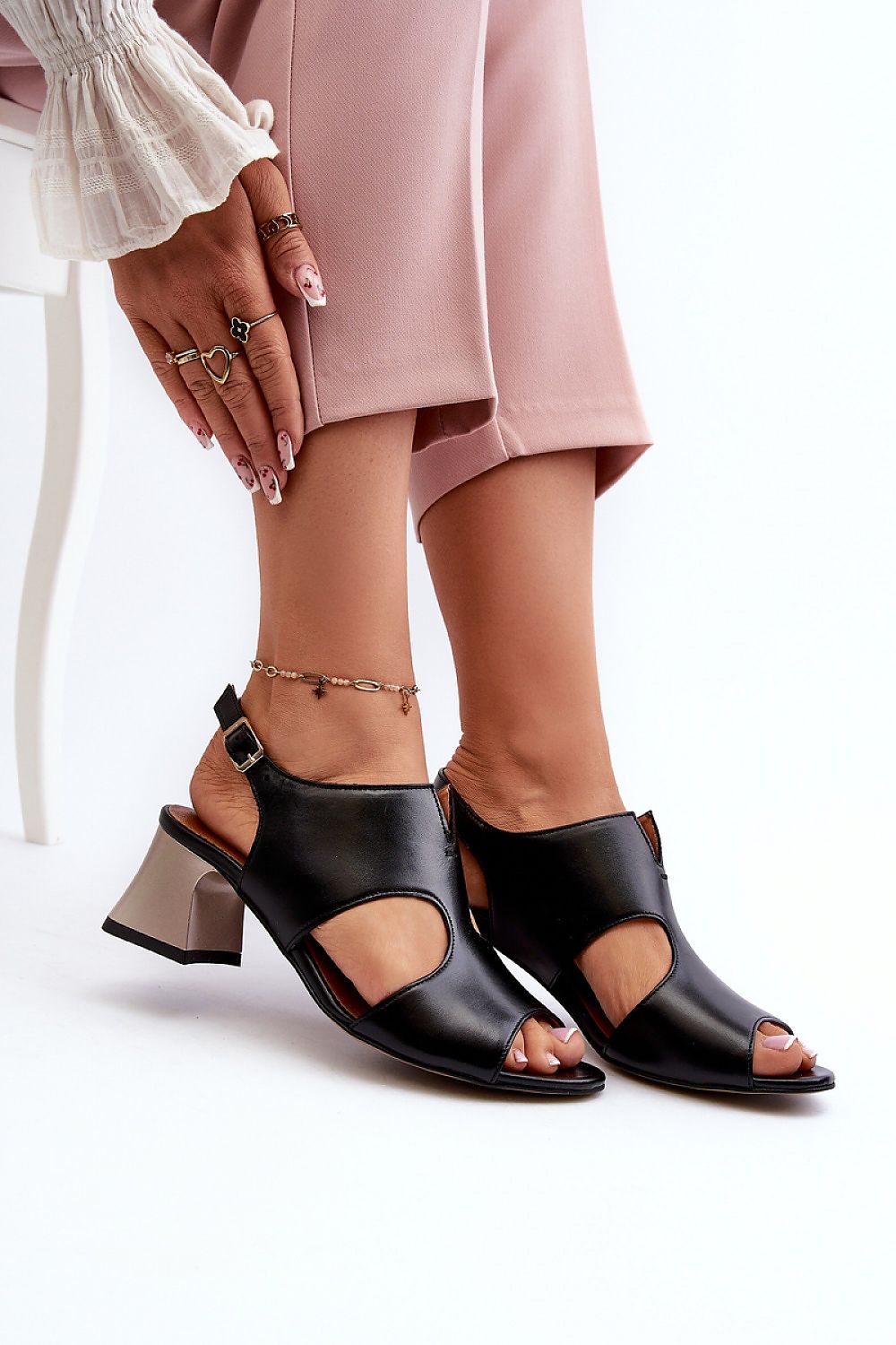 Stylish Maciejka Natural Leather Sandals on a summer backdrop, designed by Step in Style for elegance and comfort.