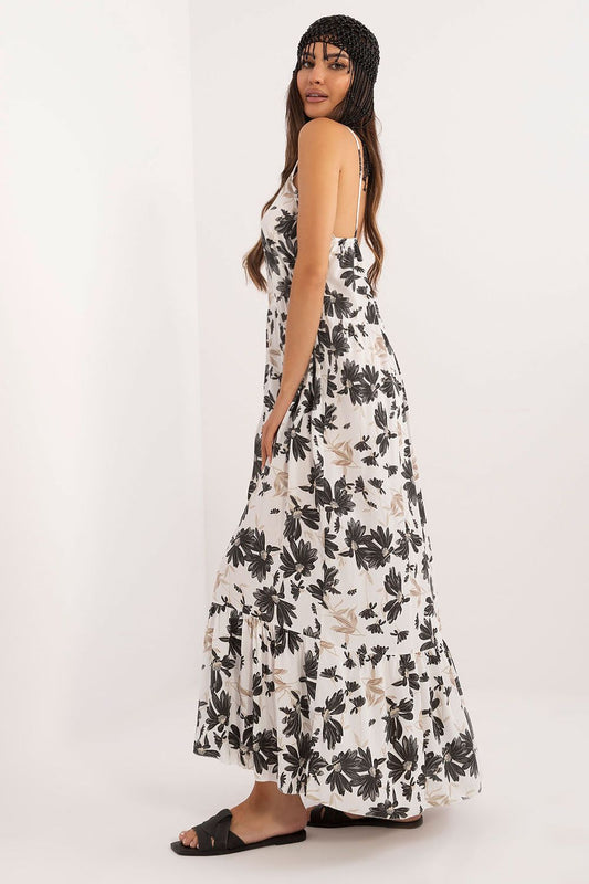 Chic strapless summer dress by Italy Moda, showcasing a beautiful floral pattern and delicate ruffle detail, perfect for warm weather outings.