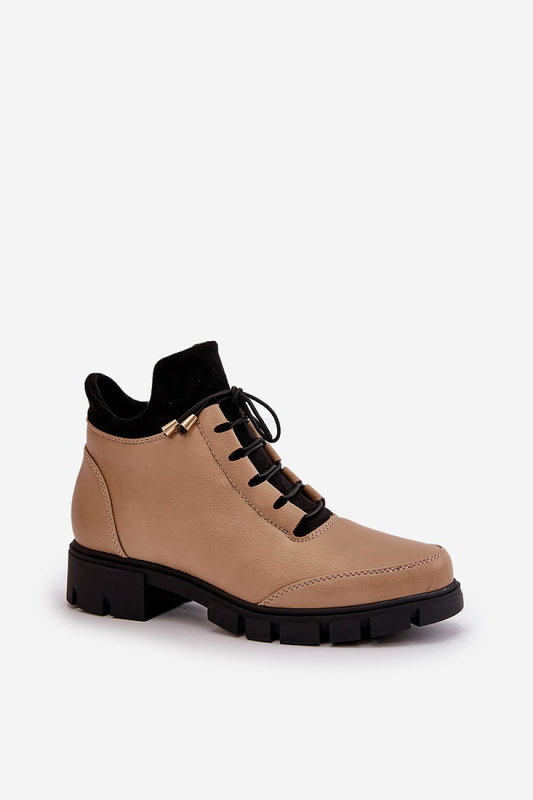 Close-up view of Jezzi women's eco leather ankle boots showcasing the detailed lacing and zipper closure, perfect for adding sophistication to casual outfits.