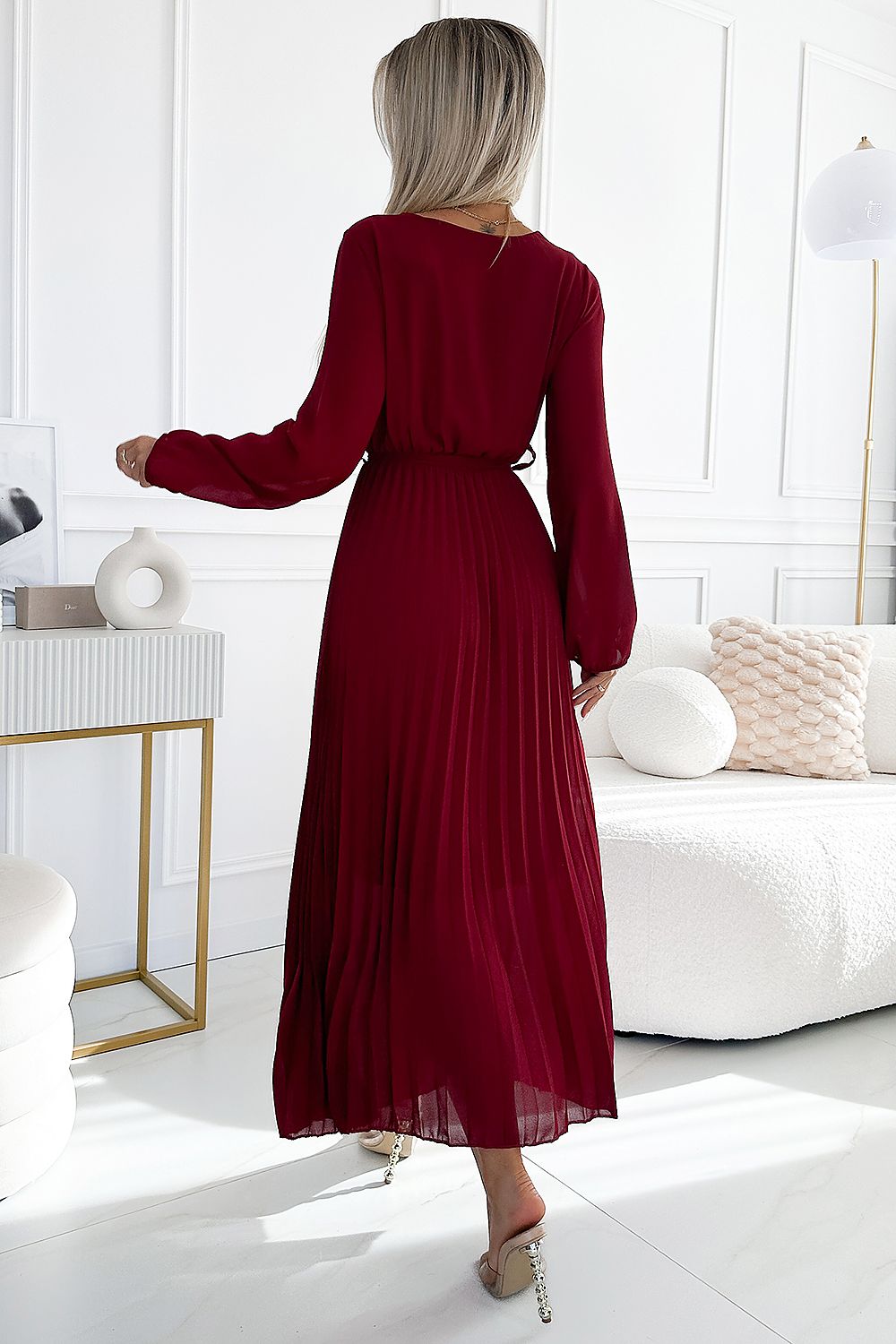 Elegant Numoco cocktail dress in burgundy with a flattering wrap neckline and long sleeves, ideal for formal events.