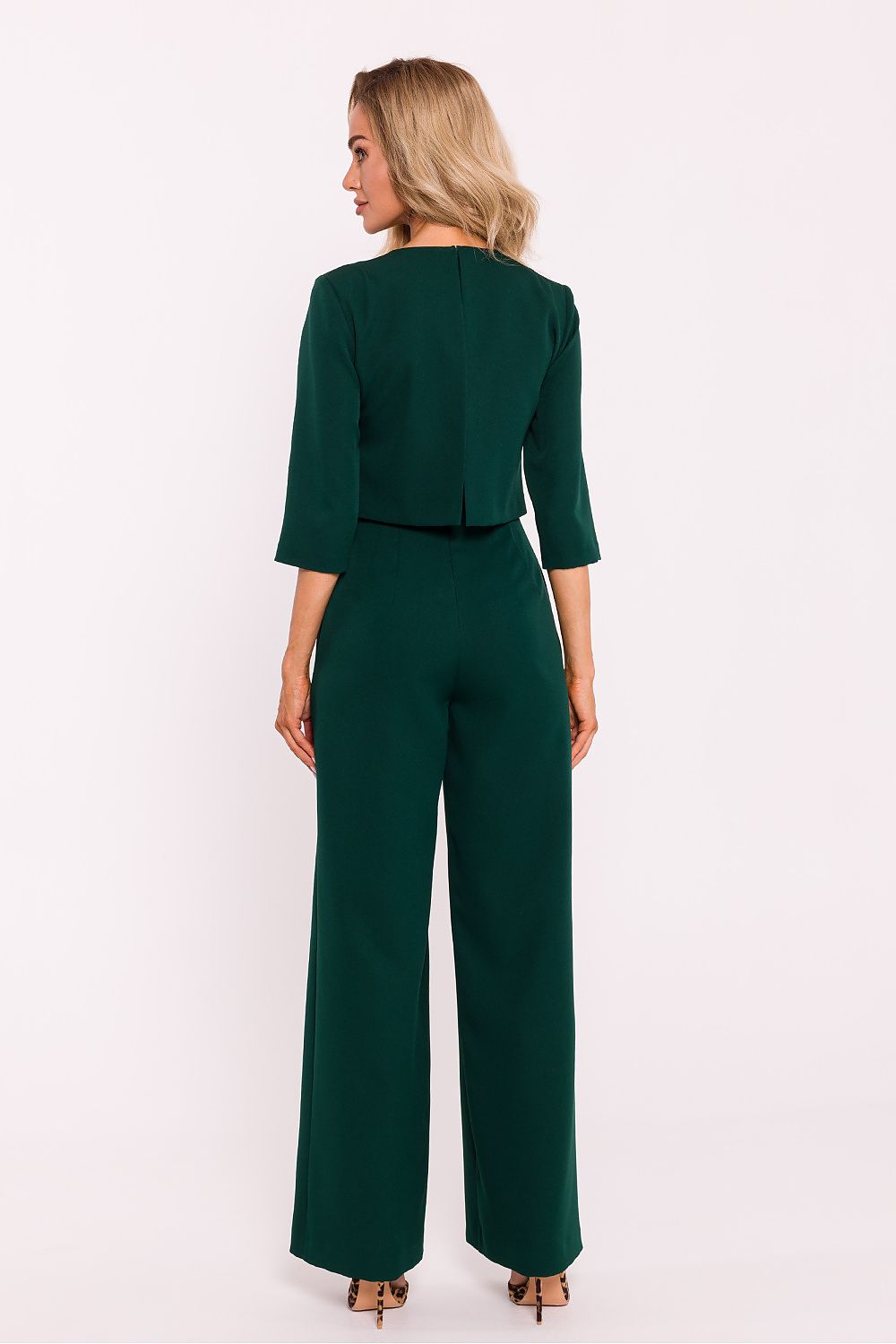Chic and sophisticated women's jumpsuit by Moe, with exquisite quality craftsmanship, elegant wide leg design, and stylish double-layered top perfect for any occasion.
