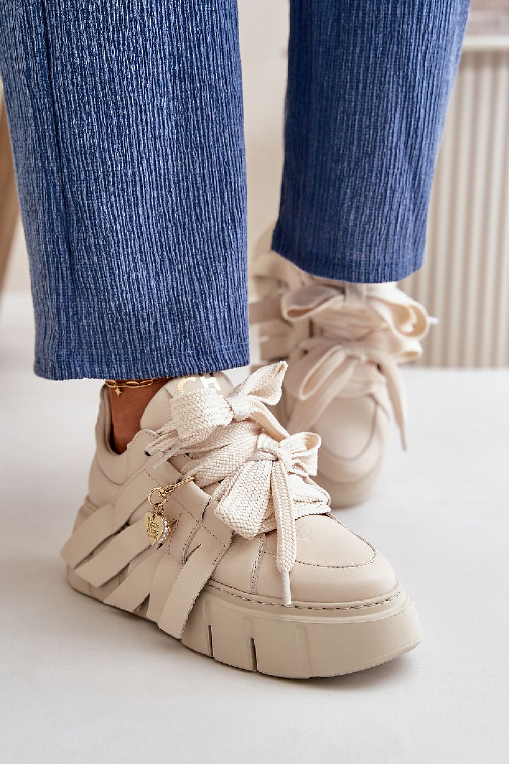 Stylish high-quality natural leather sneakers for women with unique heart accents and a 5cm platform, crafted by Step in style for the modern fashion enthusiast.