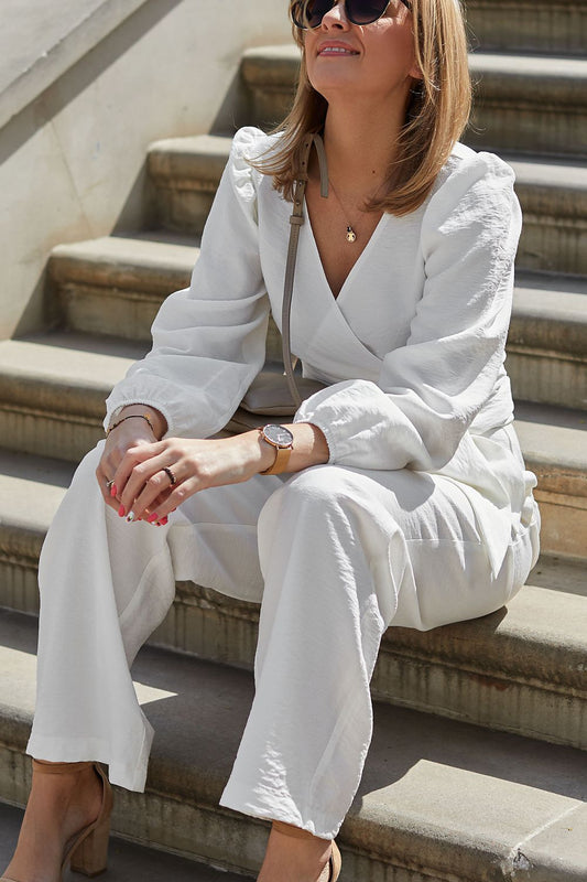 Close-up of La Aurora's sophisticated adjustable blouse from the formal set, showcasing luxurious fabric and exquisite detailing.