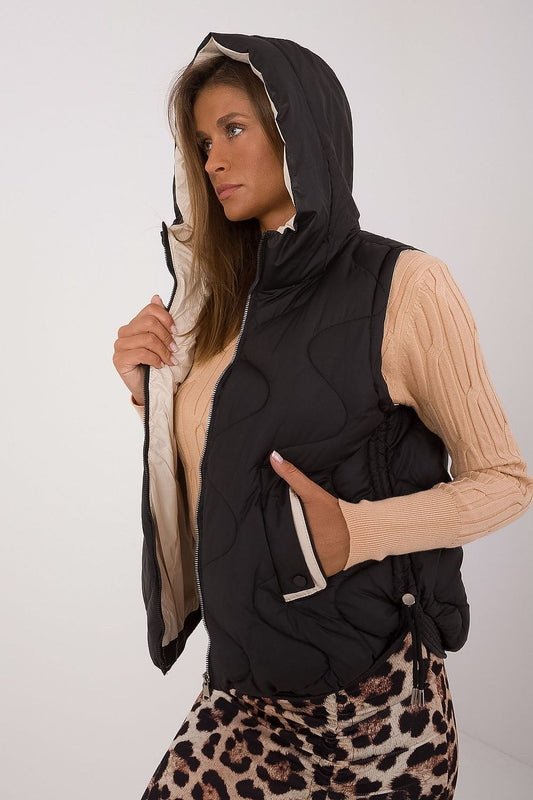 Close-up of MBM's Women's Quilted Down Vest, showcasing the smooth polyester texture and practical hood, a perfect blend of fashion and comfort for chilly days.